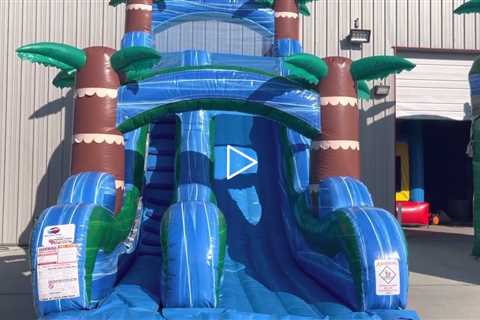18 foot blue Hurricane water slide rental with full pool rental from About to Bounce inflatables